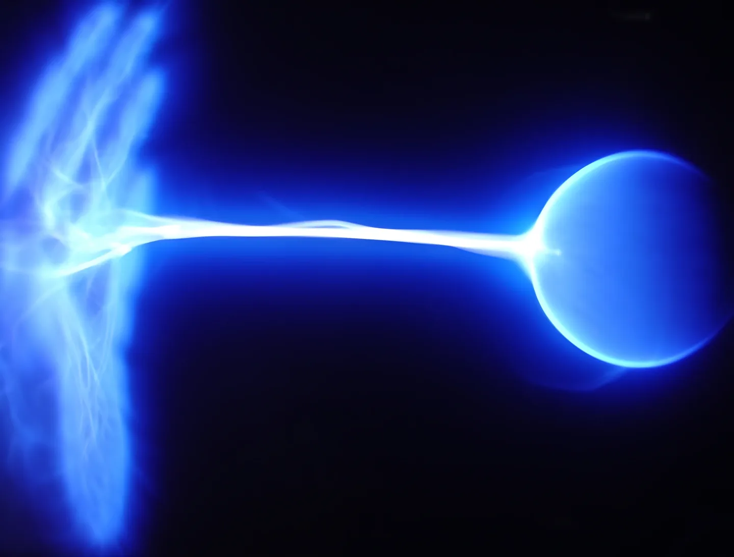 Blue energy beam striking a sphere